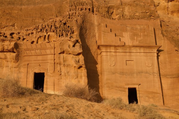 Nabataean tombs at Djabal Al-Ahmar in first daylight, Hegra or Madain Salih, AlUla region, Medina