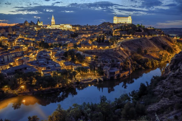 City view of Toledo with the river Tajo, blue hour, province Toledo, region Castilla-La Mancha,