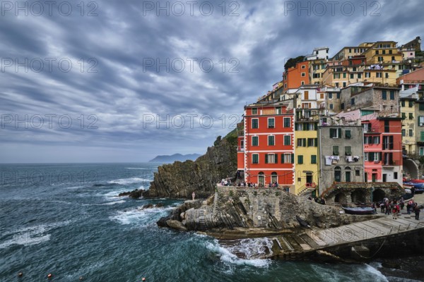 RIOMAGGIORE, ITALY, APRIL 25, 2019: Riomaggiore village popular tourist destination in Cinque Terre