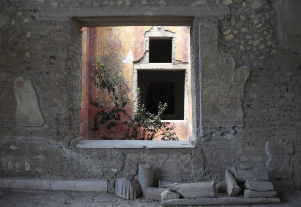 Villa of Poppea, view through window of the remains of the fresco decoration. Historic town of