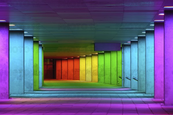 Colorful mulitcolord illuminated gallery tunnel rainbow passage under NAI building, Nederlands