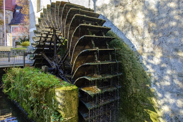 Historical mill wheel at the Klostermühle town museum, Bad Urach, Swabian Alb, Baden-Württemberg,