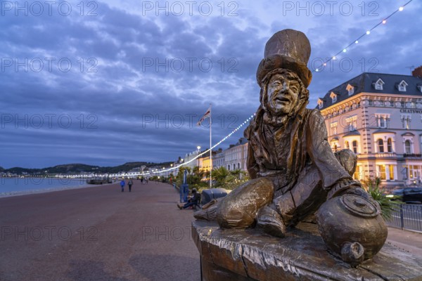 Sculpture of the Mad Hatter or The Mad Hatter from Alice in Wonderland on the promenade of the