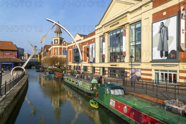 Narrow boats River Witham waterside shopping centre, Lincoln, Lincolnshire, England, UK -