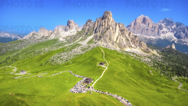 Breathtaking aerial view of the scenic passo giau with its winding road and the majestic nuvolau
