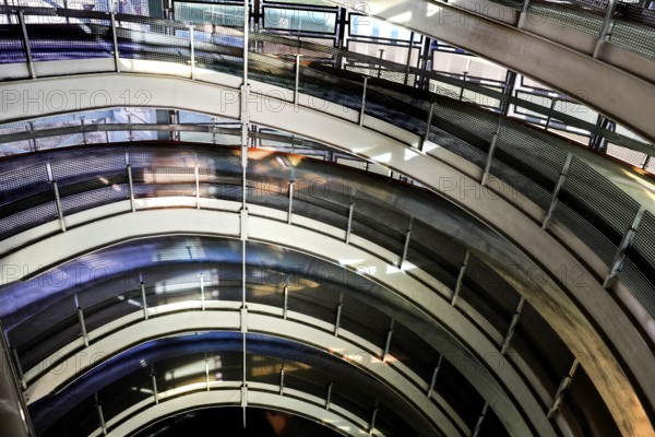 Spiral-shaped entrance and exit ramps for cars in a multi-storey car park, Berlin, 22.01.2025,