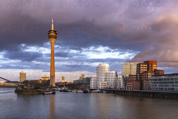 Gehry buildings - Neuer Zollhof at the Media Harbour and the Rhine Tower in Düsseldorf, North