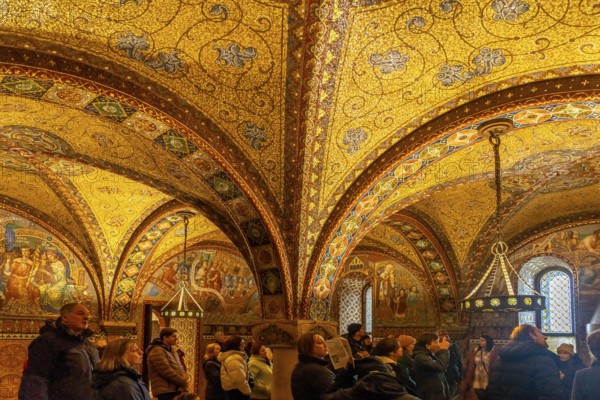 Visitors group in the Elisabethkemenate, medieval woman's chamber in the Wartburg in Eisenach,