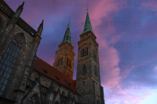 Towers of St Sebald's Church in the evening light, Nuremberg, Middle Franconia, Bavaria, Germany,