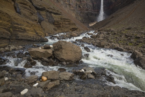 Hengifoss waterfall is located in Hengifossá in Fljótsdalshreppur, East Iceland. With 128 meters it