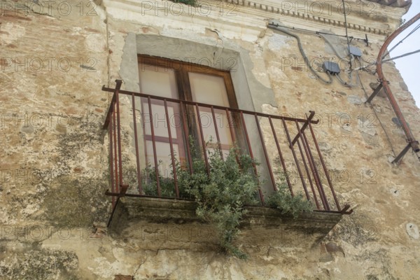 Balcony on an old house in Aliano, the very poor village in southern Italy that the writer Carlo