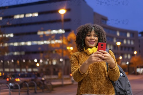 Portrait of black ethnic girl in the early morning going to the university on the way back to
