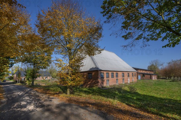 Othenstorf Estate with autumn trees and former poultry house, built around 1900, Othenstorf near