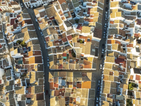 Streets and rooftops in the White Town of Olvera. Aerial view. Drone shot. Cádiz province,