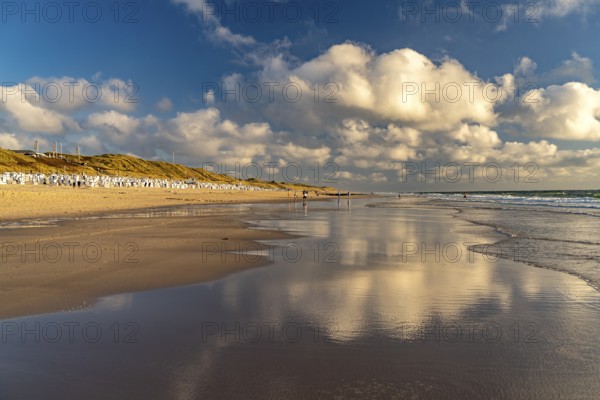 Clouds reflected in the water on the west beach near Westerland, island of Sylt, district of North