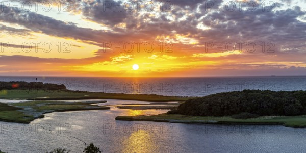 Sunset by the sea panorama on the Baltic Sea in Heiligenhafen, Germany, Europe