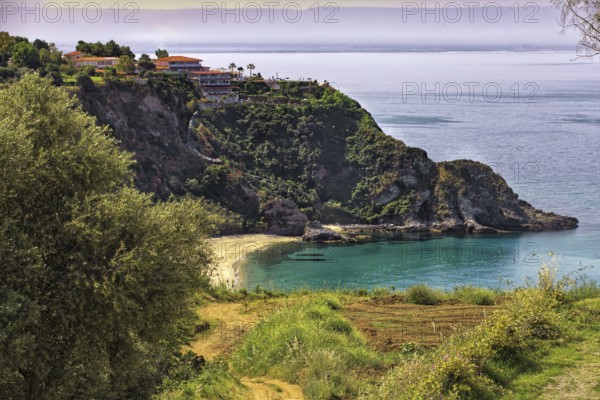 Coastal landscape with steep cliffs and blue sea. Quiet and idyllic atmosphere, Capo Vaticano,