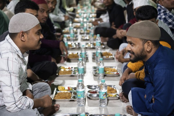 GUWAHATI, INDIA - MARCH 2: Muslims at a mosque for Ramadan's first Iftar during Muslim holy month