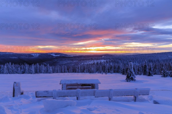 Colourful sunset in winter, view from the Wossecker Baude above Harrachsdorf in the Giant