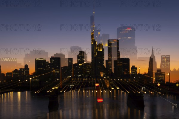 The silhouette of Frankfurt's banking skyline stands out in the evening against the residual light
