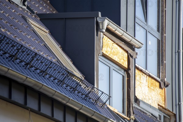 Extension of living space by installing a dormer window: Newly installed dormer window on a newly