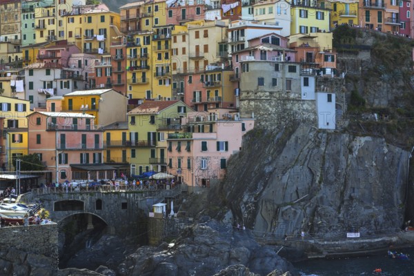 Colourful multi storied stucco cladded residentialapartment buildings in Manarola village, Cinque