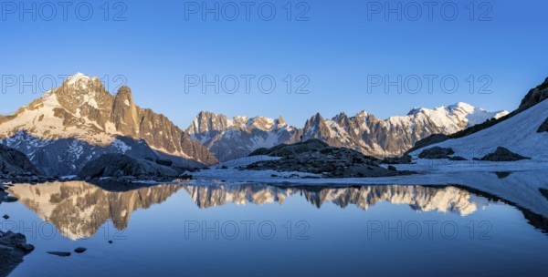 Mountain landscape in the evening light, water reflection in Lac Blanc, mountain peak, Aiguille