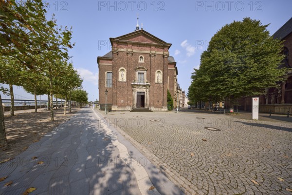St Joseph's Chapel and riverside promenade with plane trees on Emilie-Schneider-Platz in the old