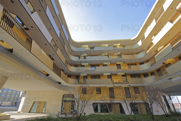 Modern golden building Pandion Doxx, golden, residential complex, inner courtyard, customs harbour,
