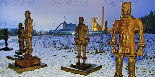 People made of iron, multi-part iron sculpture by Zbigniew Fraczkiewicz in front of the