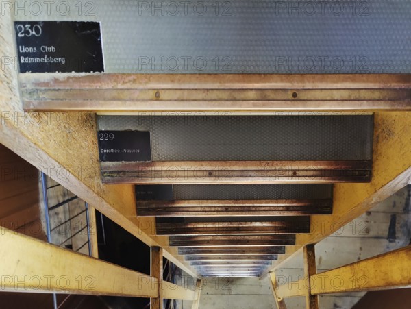 Staircase to climb the church tower with nameplates on each step as fundraising, Evangelical