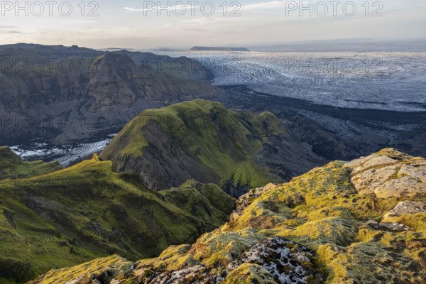 Impressive landscape with mountains and glaciers in the evening light, glacier tongues Huldujökull