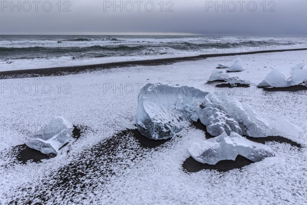 Ice floes on the beach, snowy, waves, sea, clouds, winter, Diamond Beach, Breidamerkursandur,
