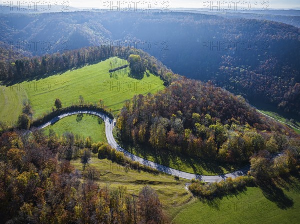Country road near Lenningen with winding road, landscape on the Swabian Alb in autumn. Aerial view