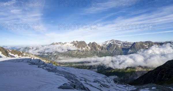 View of mountain peaks and the valley of Chamonix with high fog, Chamonix, Haute-Savoie, France,