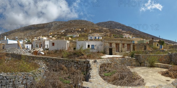 The traditional and idyllic mountain village of Avlona with stone houses and dry vegetation,