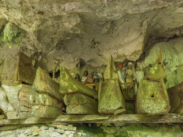 Ancient burial sites, old wooden coffins and carved dolls, rock tombs, Tau Tau Lemo, Rantepao, Tana