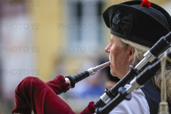 Portrait of a bagpiper, bagpipe orchestra, pipe concert, Sigmaringen, Baden-Württemberg, Germany,