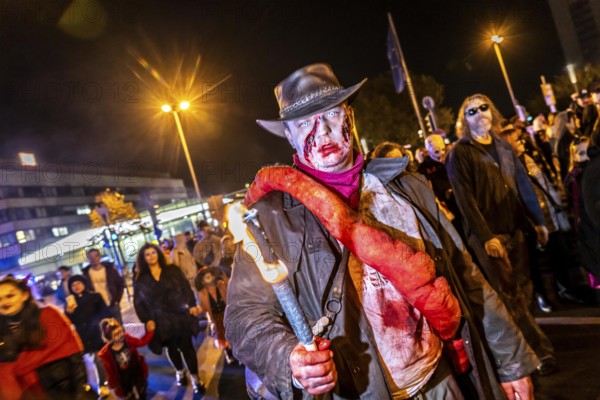 The Zombiewalk in Essen, on Halloween several hundred people, some dressed as scary zombies,