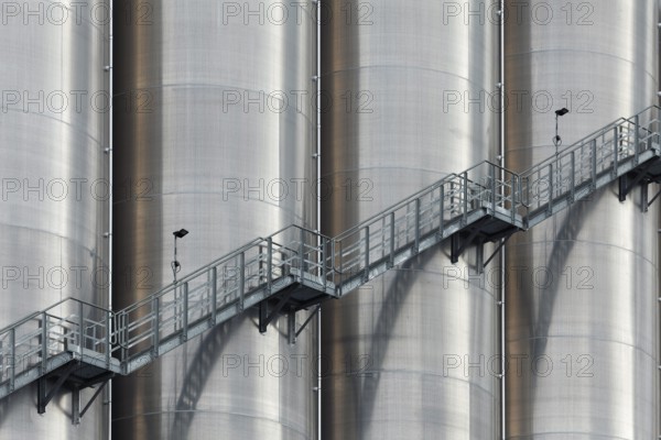 High silo facility for bulk goods, aluminium silo with external staircase, Parallelhafen,