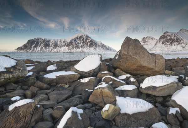 Winter evening mood at Skagsanden, stones on the beach near Flakstad, Flakstadøy, Lofoten,