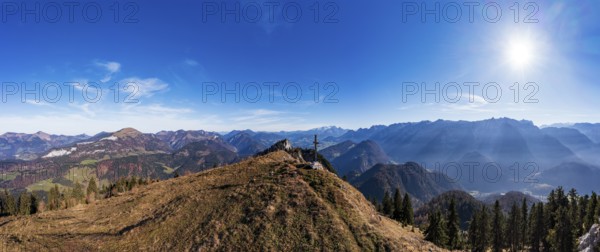 Drone shot, summit cross on the Schwarzer Berg with a view of the Lammertal with Dachstein massif