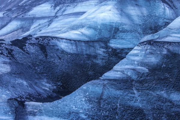Mýrdalsjökull glacier with layers of black volcanic ash, ice cap on the top of the active Katla