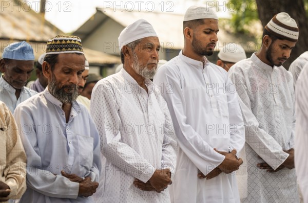 KAYAKUCHI, INDIA - MARCH 31: Muslims perform Eid al-Fitr prayer at Eidgah in Kayakuchi, India on