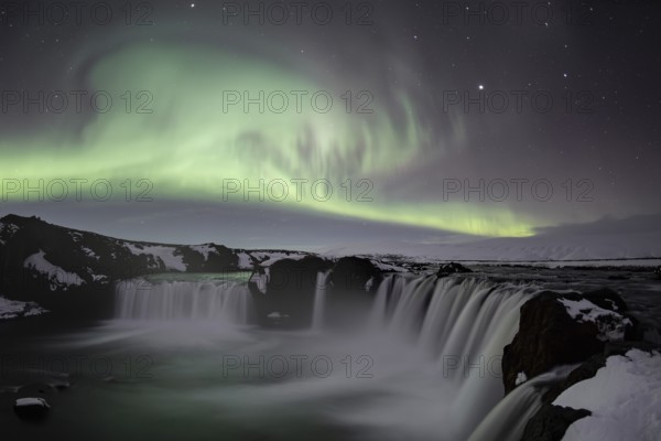 Northern Lights or Aurora Borealis, river Skjálfandafljót, waterfall Góðafoss or Godafoss, long