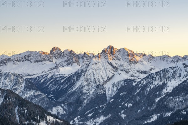 Beautiful landscape of the Mountain silhouettes of the Sexten Dolomites on a sunny winter day,