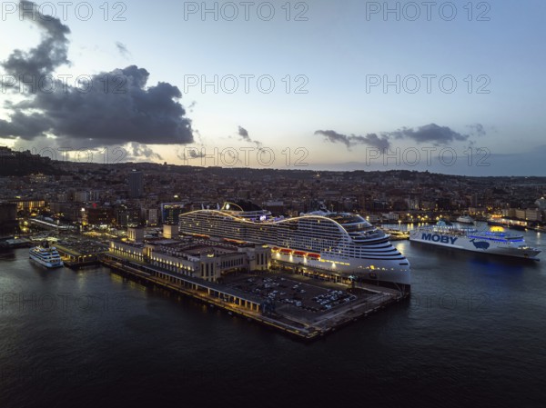 Naples Ferry Terminal at night from a drone, Molo Immacolatella Vecchia, Naples, Campania, Italy,