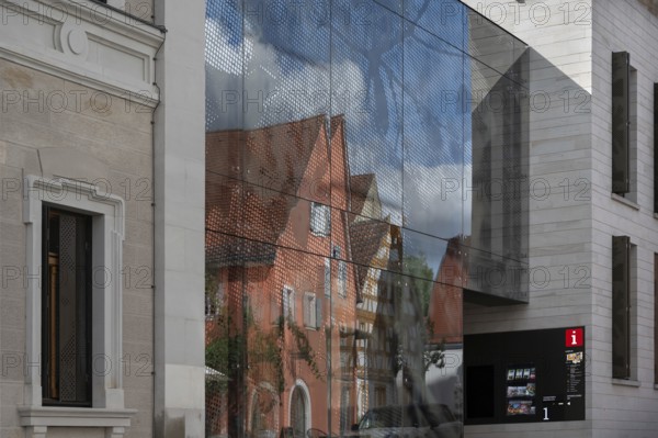 Reflection in the facade of the service centre, former old school, Iphofen, Lower Franconia,