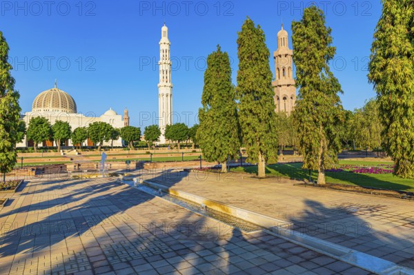 Park of the Sultan Qaboos Mosque, behind the mosque with the domes and minarets, Muscat, Arabian