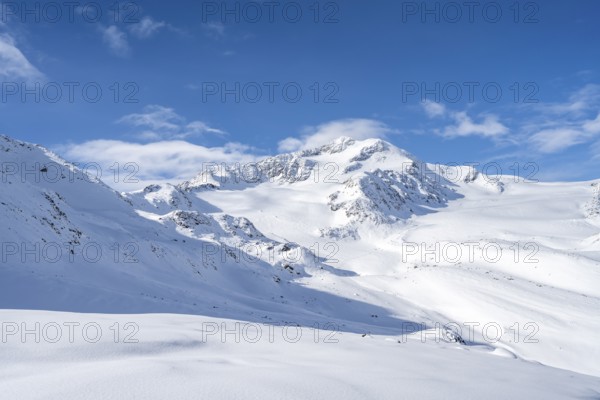 Snow-covered mountain landscape, mountain peak Monte Cevedale and glacier Zufallferner and